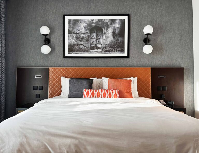 Sibley grove al khozama kaust hotel saudi arabia guest bedroom quilted leather headboard luxury interior design