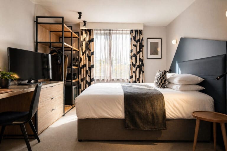 Sibley grove fox and goose hotel ealing london guest room circular design oak steel furniture refurbishment